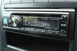 An in-dash DAB car radio tuned to Kisstory