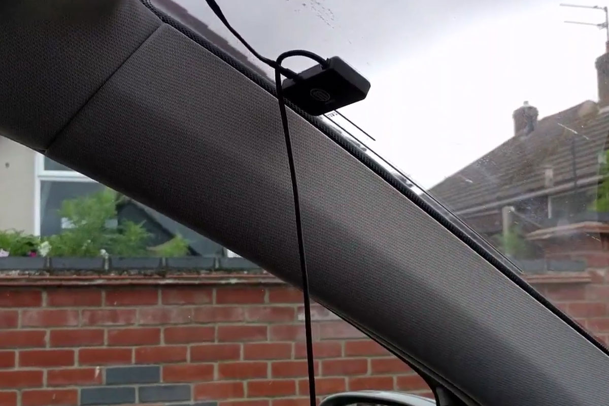 Install the film antenna on the windscreen