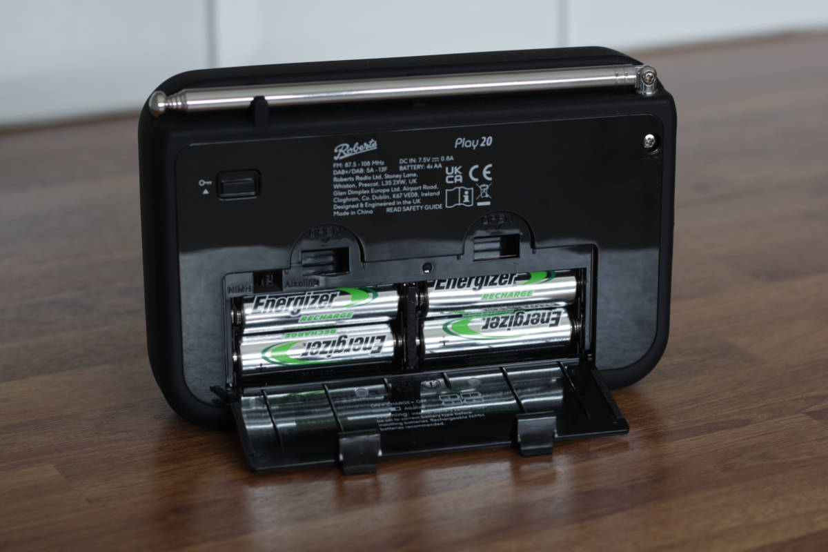 Rechargeable AA batteries are inserted in the compartment on the rear